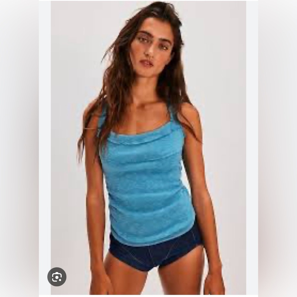 Free People My Reputation Tank. Size medium. NWOT.
In BLUE